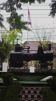 Locomotive used for transporting tin mining products left by the Dutch in Indonesia photo
