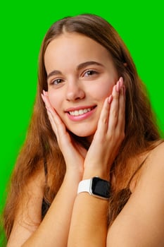 Smiling Young Woman in Black Top and Tan Pants Portrait photo