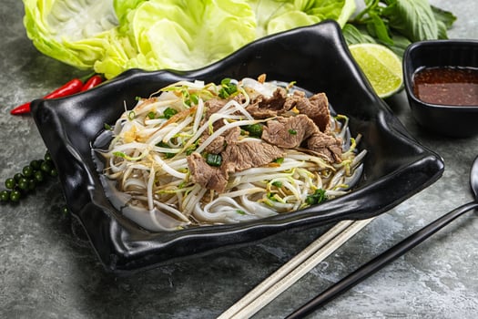 Vietnamese traditional soup Pho Bo with beef photo