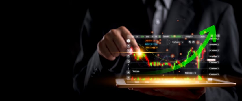 Businessman holding tablet with graph on screen photo