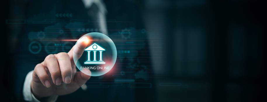 Businessman touching banking icon on virtual screen photo