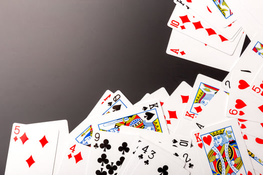 poker chips and cards on black background photo
