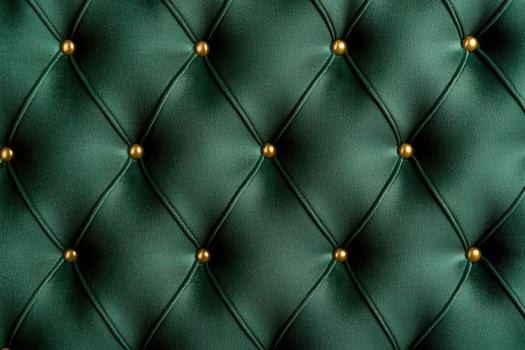 Luxurious green upholstery with golden buttons photo