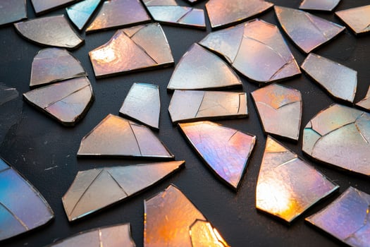Shattered glass mosaic with iridescent colors photo