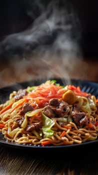 stir fried yakisoba noodle with beef and vegetables photo