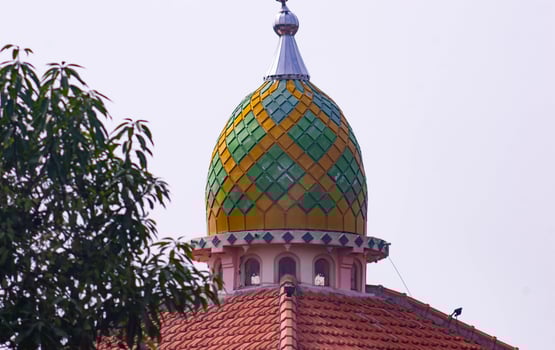 The mosque dome features a striking green pattern and color. A mosque dome design commonly found in Indonesia. photo