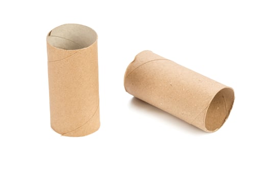 Empty toilet paper on white background photo