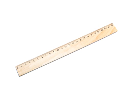 wooden ruler isolated over a white background photo
