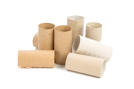 Empty toilet paper on white background photo