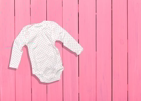 Children's clothing on wooden boards photo