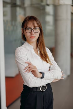 A Confident Businesswoman Exemplifying Professionalism in a Modern Office Environment photo