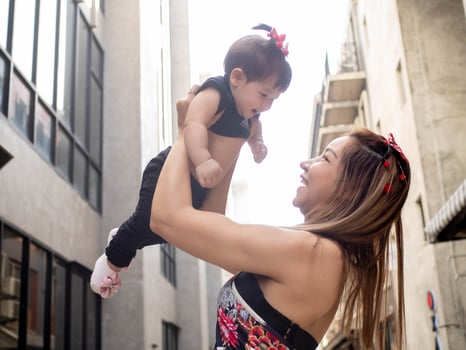 Mother child kid girl person mom Holding a son jump fly wing happy smile new born cute baby together love family infant small cute portrait adorable parent innocence human new life embracing enjoy photo