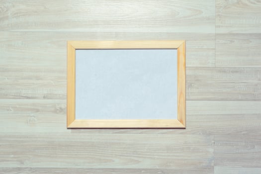 photo frames on the wooden wall