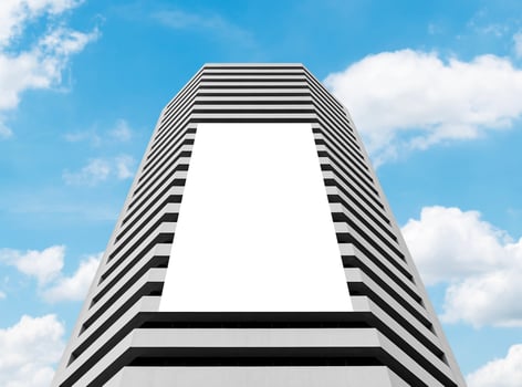 Mock up white vertical large LED display billboard on tower building. Clipping path for mockup photo