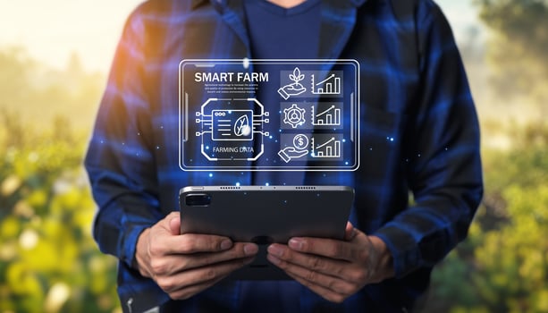 Man holding tablet with smart farm concept photo