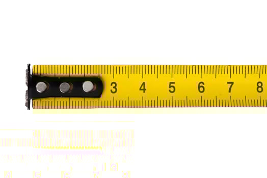 Tape measure on white background photo