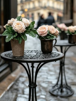 Elegant roses in ornate vase on decorative table photo