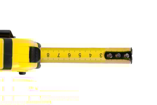Tape measure on white background photo