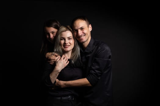 family on a black background photo
