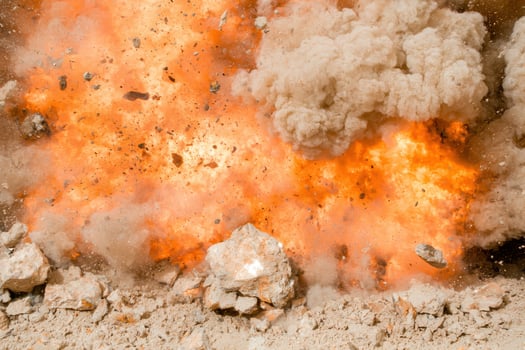 Dramatic explosion with smoke and fire photo