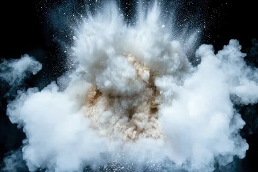 Dramatic explosion of white smoke and debris photo