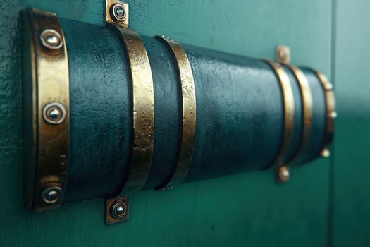 Close up of an industrial pipe with metal clamps photo