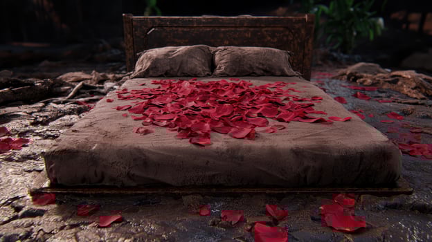 romantic rose petal covered bed in forest photo