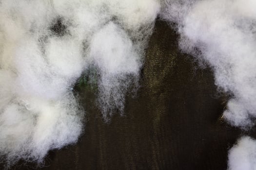 White Cotton Fiber Texture on Dark Background photo