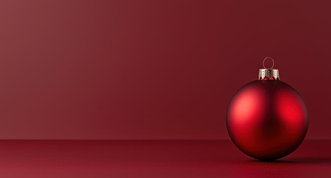 Festive red christmas ornament on a dark background photo