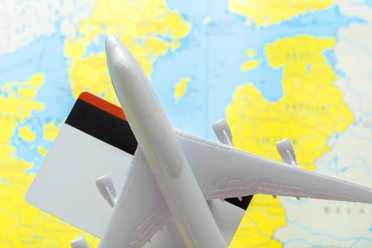 miniature of a passenger aircraft flying on a map photo