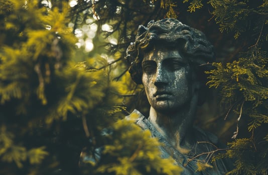 ancient statue in forest photo