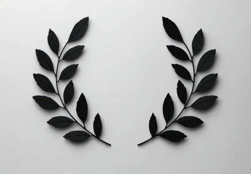 Elegant black leaves forming a symmetrical wreath photo