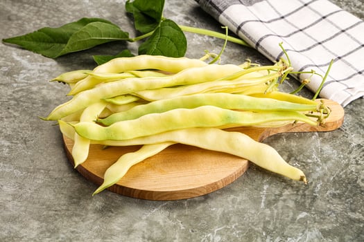 Raw green bean strings heap photo