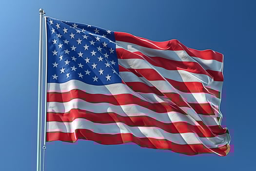 Vibrant American Flag Waving Against Clear Blue Sky - Patriotic Symbol for Celebrations and Design photo