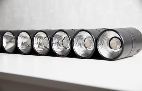 Modern LED lamps in the form of a tube for the ceiling on a white background. Close-up photo