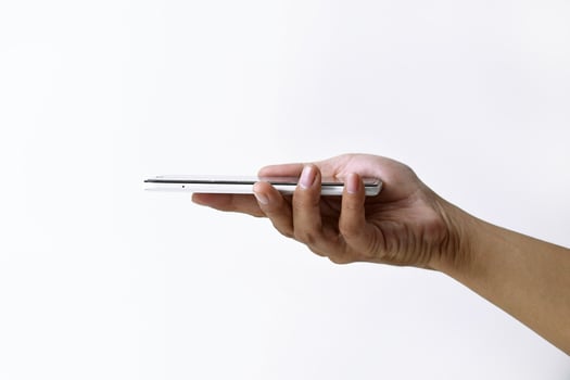 Male hand shows the screen of a smart phone which has a white screen photo