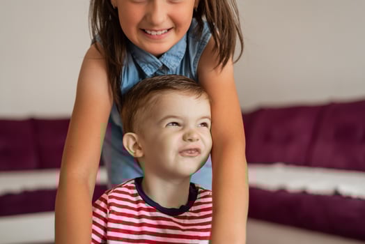 Happy children have fun together while playing at home. photo