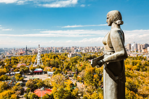 Yerevan, Armenia - 19th october, 2024- Aerial close up face view Mother Armenia statue. Female personification of Armenia. Famous high monumental statue in Victory Park overlooking the capital city photo