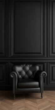 Elegant black leather armchair against a dark paneled wall photo