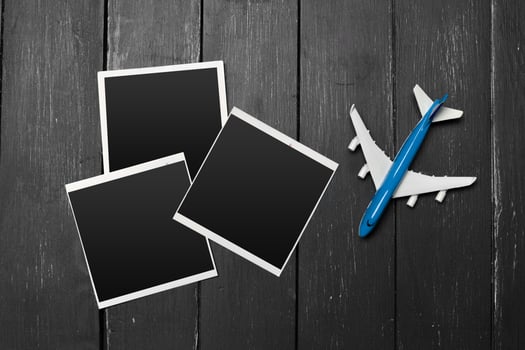 Model airplane on the wooden background photo
