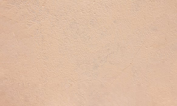 Background from a beige wall, background for graphic design, background for inscriptions photo