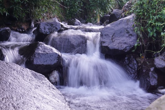 river waterfall with rocks photo