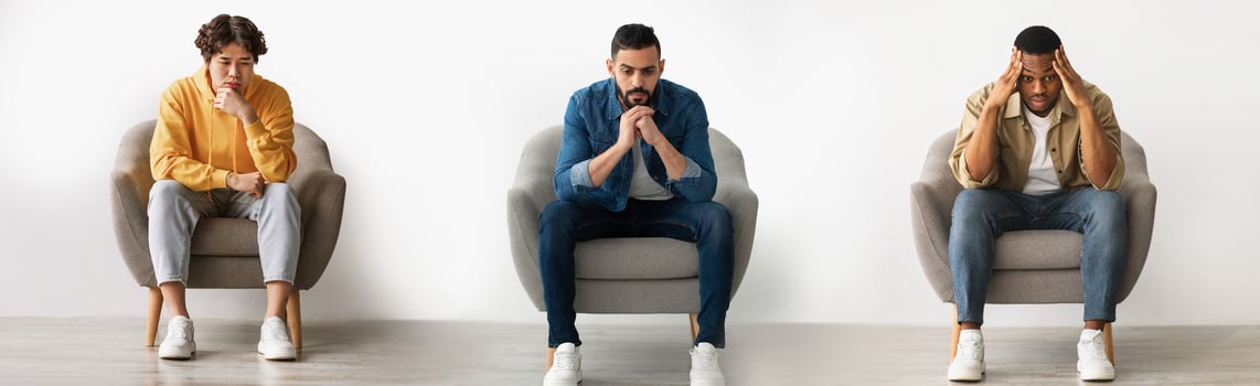 Collage Of Three Different Pensive Men Sitting On Chair Over White Wall Indoors, Young Upset Multiethnic Males Thinking About Something, Suffering Depression Or Life Problems, Panorama photo