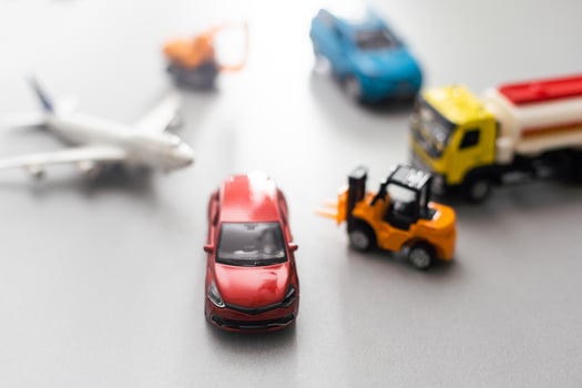 Travel concept. Toy model of car and airplane. photo