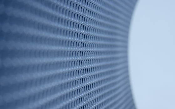 Rolled sheet of shockproof material with extruded round texture. Abstract 3d background of blue textured surface photo