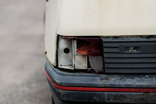 car's front light is broken photo