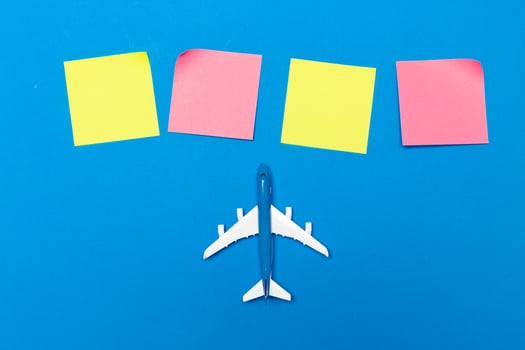 model of passenger plane on blue background photo