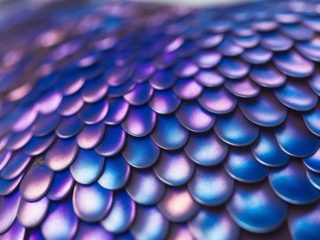 A close up of a purple and blue dragon scales photo