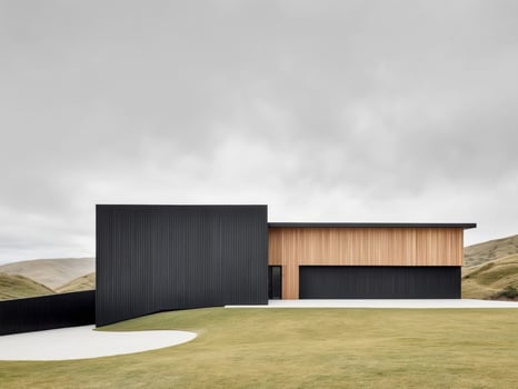 A modern black house on a hillside photo