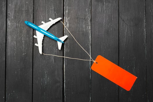 Model airplane on the wooden background photo